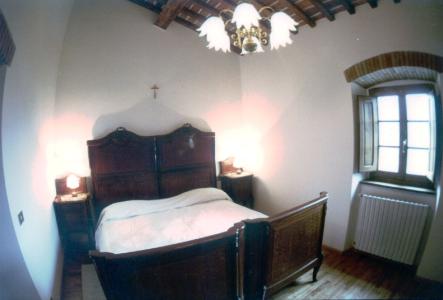 bedroom with view in the park of San Savino farmhouse on the first floor